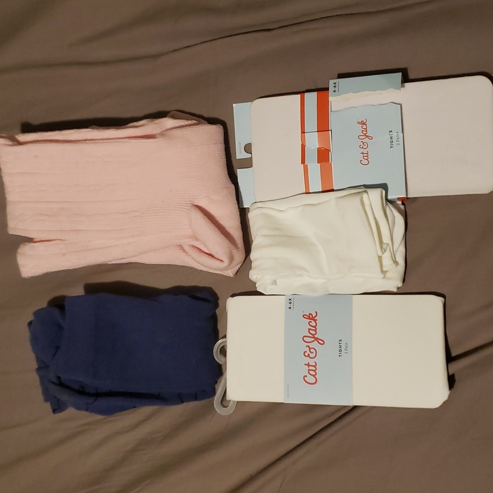 Girls tights size 4-6x white ones were never worn. Pink & blue are gently used.